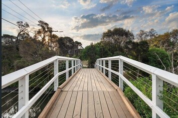 You walk across this Kananook Creek bridge to the Beach