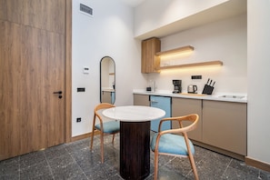 Superior Apartment | Private kitchen | Mini-fridge, coffee/tea maker, electric kettle, highchair - Urban Quarters - Boğazkesen (Istanbul)