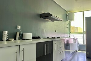 Stovetop, coffee/tea maker, toaster, cookware/dishes/utensils - Panoramic Sea View in Sidi Rahal (Sidi Rahal)