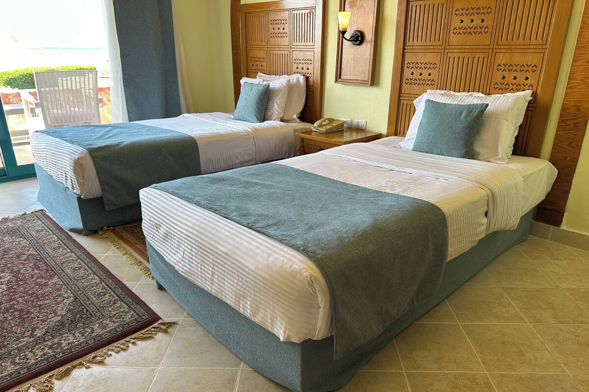 Egyptian cotton sheets, premium bedding, minibar, in-room safe