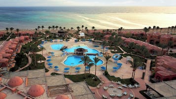 3 outdoor pools, open 8:00 AM to 6:00 PM, pool umbrellas, sun loungers