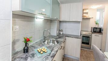 Apartment (Two Bedroom Apartment with Balcony an) | Private kitchen | Fridge