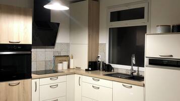 Réfrigérateur, four, plaque de cuisson, lave-vaisselle