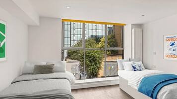 Studio, Multiple Beds, Non Smoking | Blackout drapes, iron/ironing board, free WiFi, bed sheets