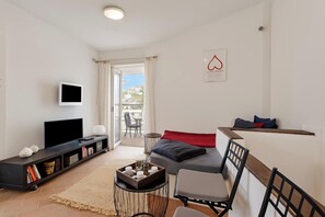 Standard House, Multiple Bedrooms (Casa Veronica) | Living area | 21-inch flat-screen TV with cable channels, TV