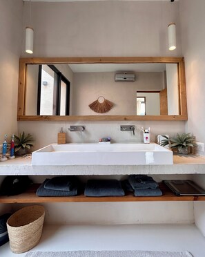 Shower, towels, soap, shampoo