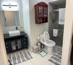 Shower, hair dryer, towels, soap