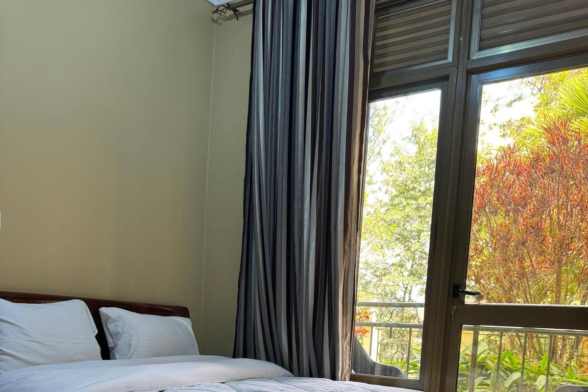 Blackout drapes, iron/ironing board (on request)