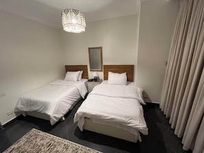 3 slaapkamers, een strijkplank/strijkijzer, wifi