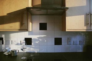 Appartement | Cuisine privée | Réfrigérateur, un four, surface de cuisson, lave-vaisselle