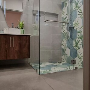 Shower, towels, soap, toilet paper