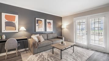 Standard Apartment, 3 Bedrooms (QueenBed) | Living area | 50-inch Smart TV with digital channels