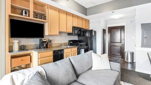 Standard Studio, 1 Queen Bed | Private kitchen | Full-size fridge, microwave, stovetop, dishwasher