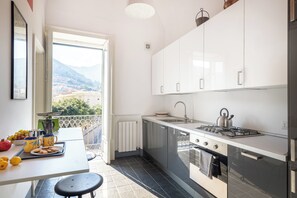Apartment, Balcony | Private kitchen - Eleganza in Centro a Cefalù by Wonderful Italy (Cefalù)