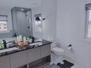 Hair dryer, towels, soap, shampoo