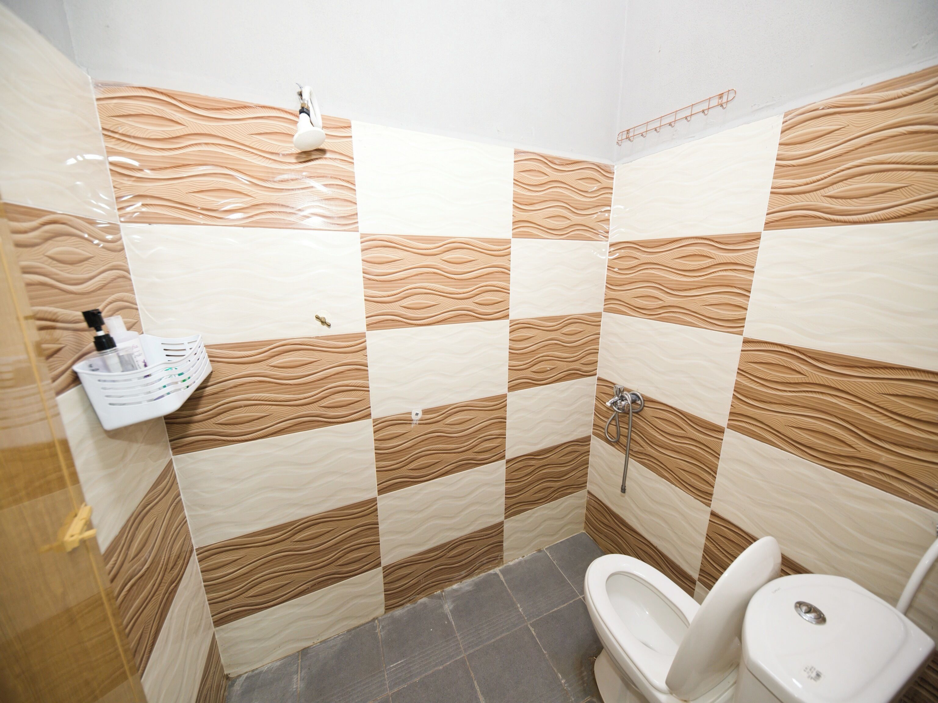 Shower, rainfall showerhead, bidet, towels