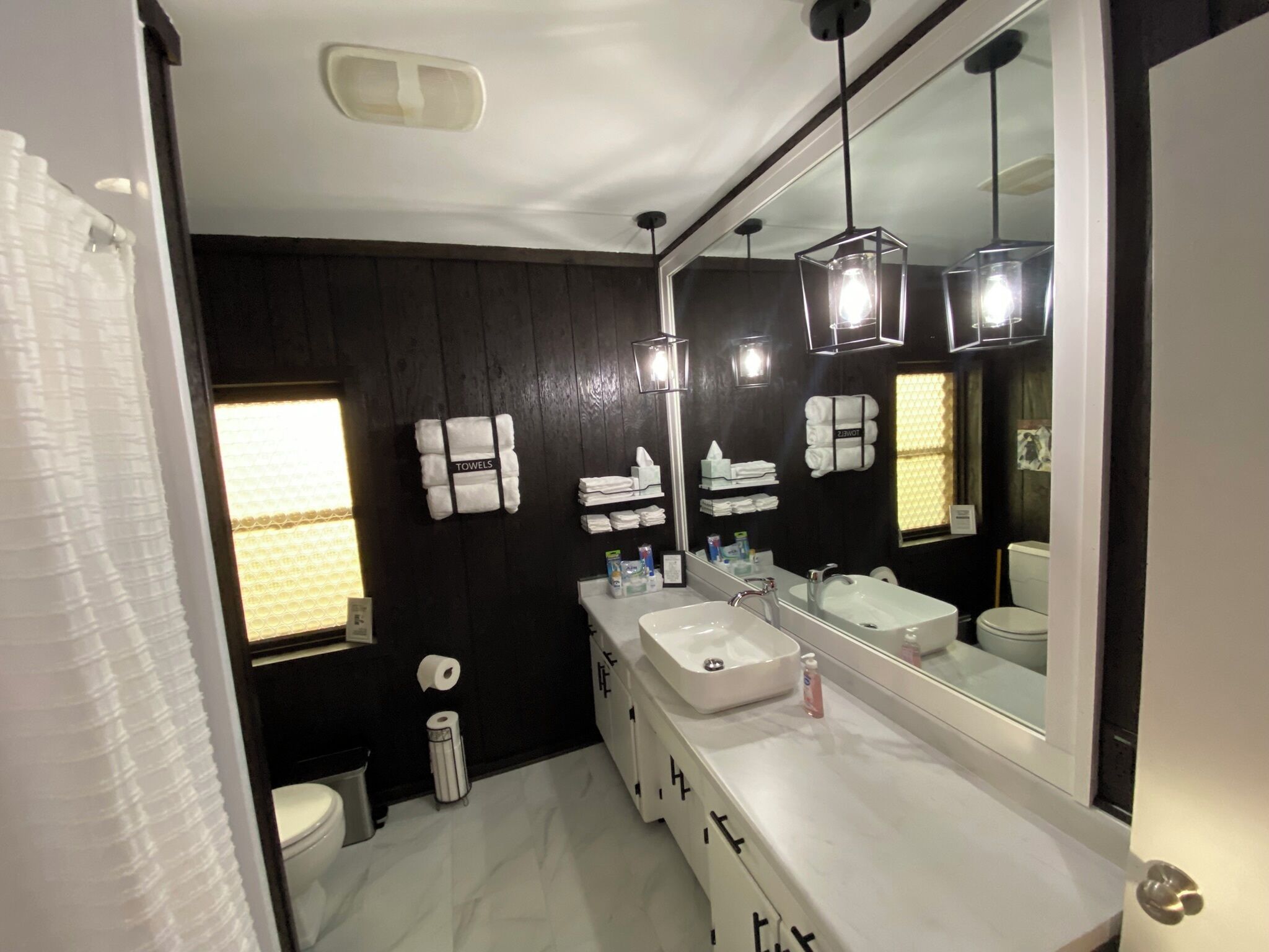 Hair dryer, towels, soap, toilet paper