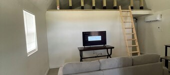 Cozy cabin with 1 bedroom and WiFi, AC & located on 40 acres with great views.