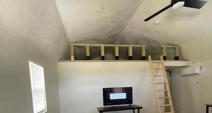 Cozy cabin with 1 bedroom and WiFi, AC & located on 40 acres with great views.