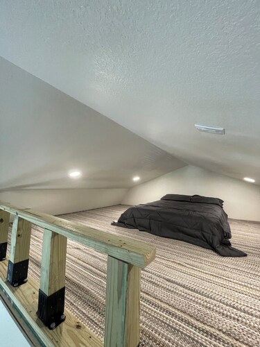 Cozy cabin with 1 bedroom and WiFi, AC & located on 40 acres with great views.