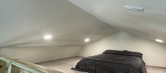 Cozy cabin with 1 bedroom and WiFi, AC & located on 40 acres with great views.