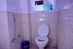 Double Room, City View | Bathroom | Shower, towels, soap, shampoo - Banaras Rest House  (Varanasi)