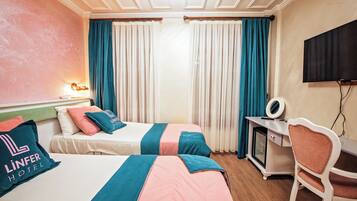 Deluxe Room | 1 bedroom, blackout drapes, free WiFi