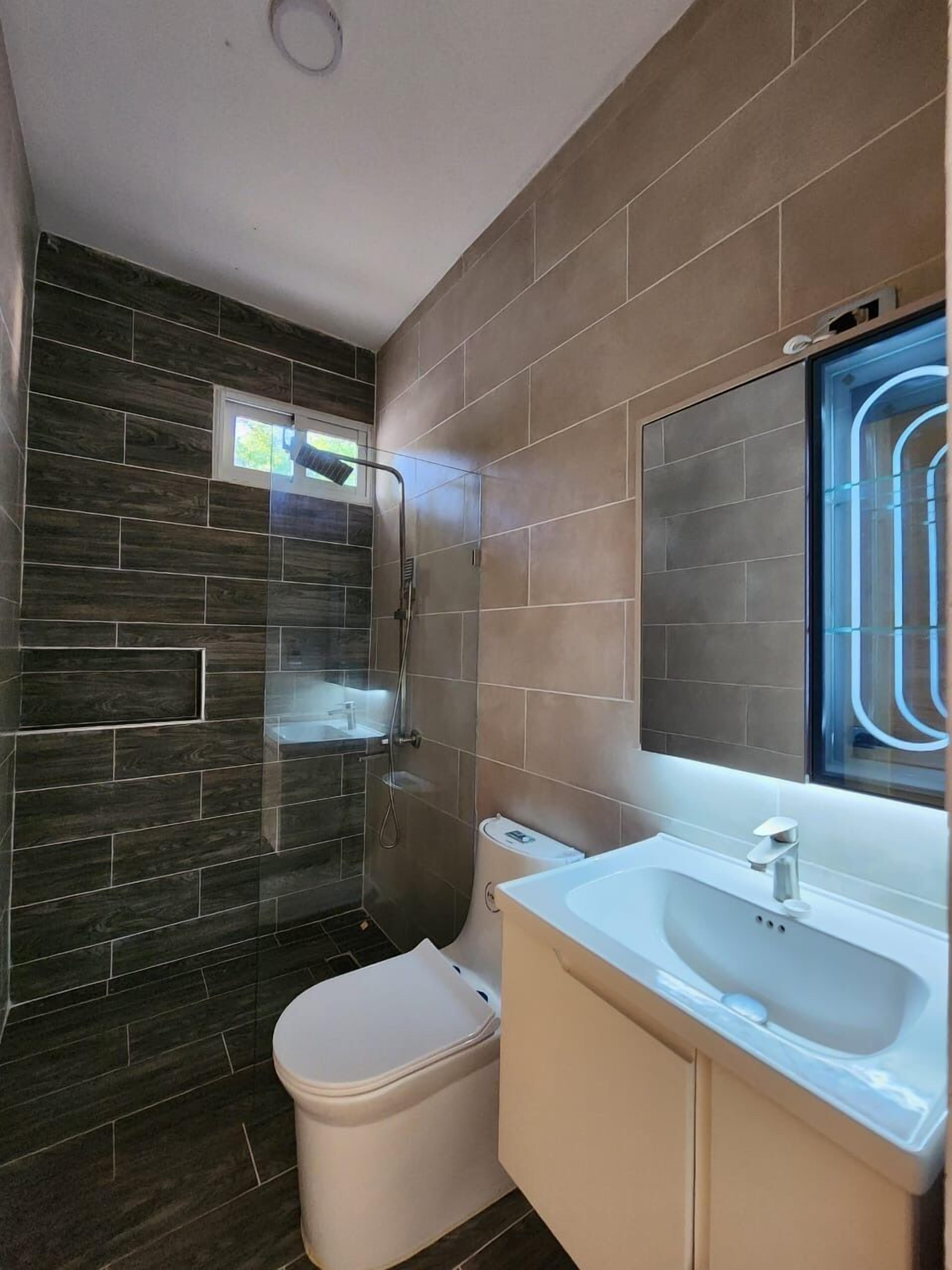 Deluxe Villa, Patio, Garden View | Bathroom | Free toiletries, towels, soap, shampoo