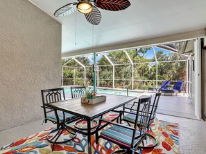 Outdoor dining - 5 Beds 3 Bedroom 2 Bath Heated Pool, Grill, Patio. 5 minutes from the beach! (Marco Island)