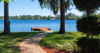 Lakeside Retreat~ Large home with pool, dock, game room and balcony on lakefront