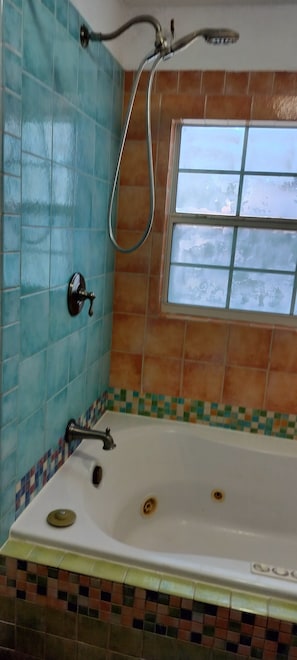 Jetted bath, hair dryer, towels, soap