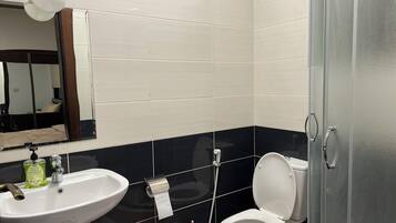 Shower, towels, soap, shampoo