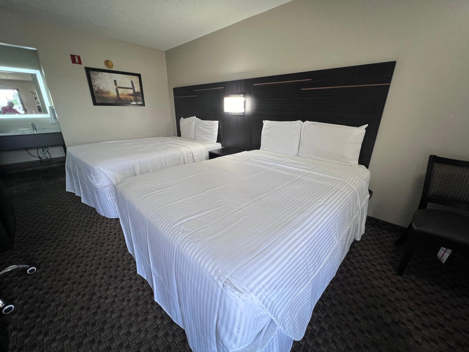 Desk, laptop workspace, blackout curtains, iron/ironing board