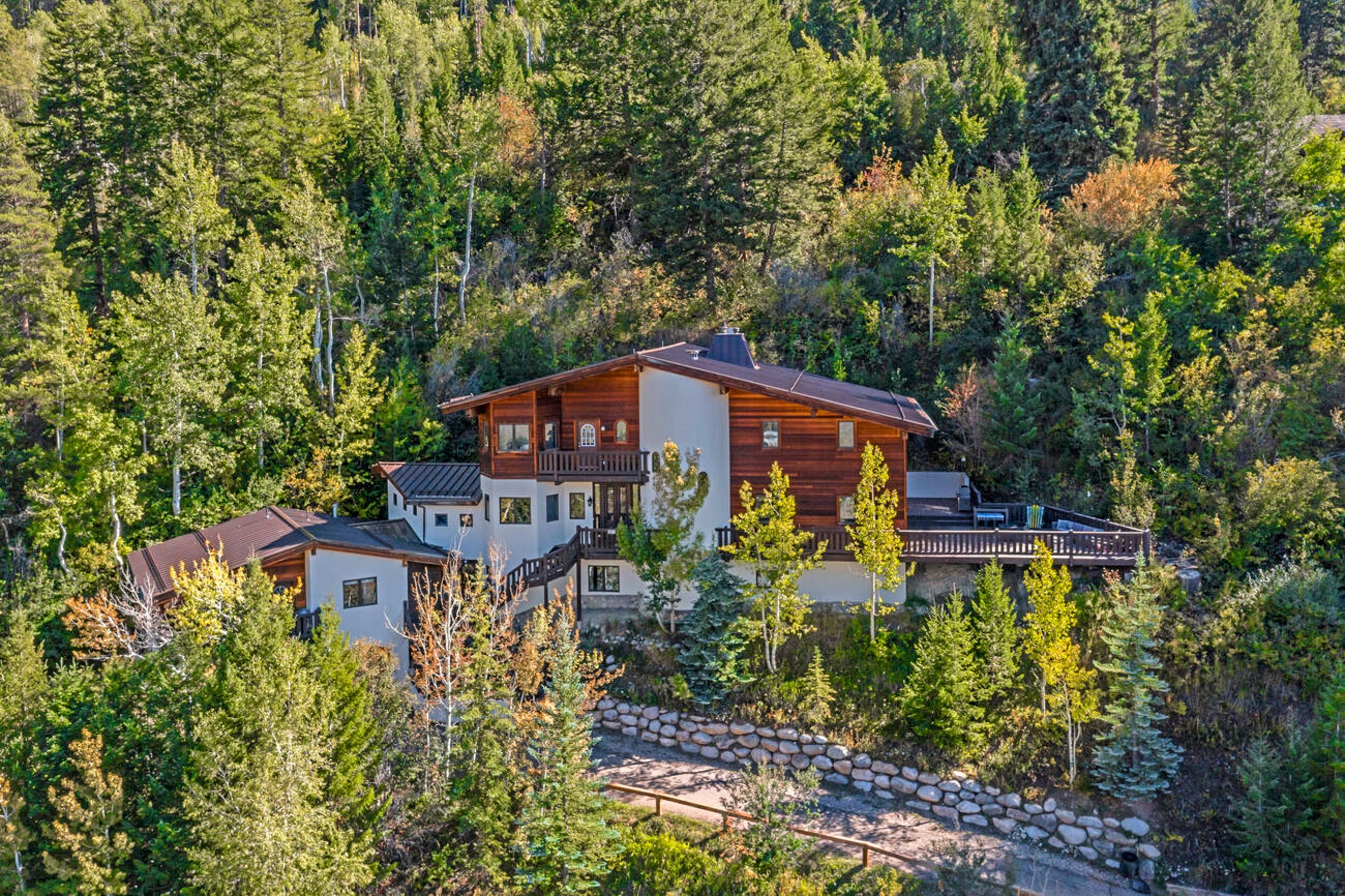 Discover Elevated Mountain living, features separate lock-off