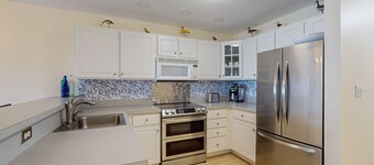 Convenient Location, Pool, Balcony with Views of the Bay