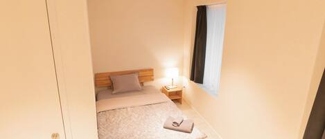 Habitación individual estándar | Caja de seguridad en la habitación y escritorio