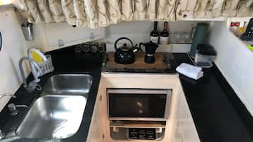 Fridge, stovetop, cookware/dishes/utensils