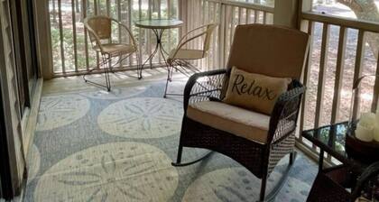 Spacious condo on Jack Nicklaus Signature Golf Course overlooking 10th Tee Box.