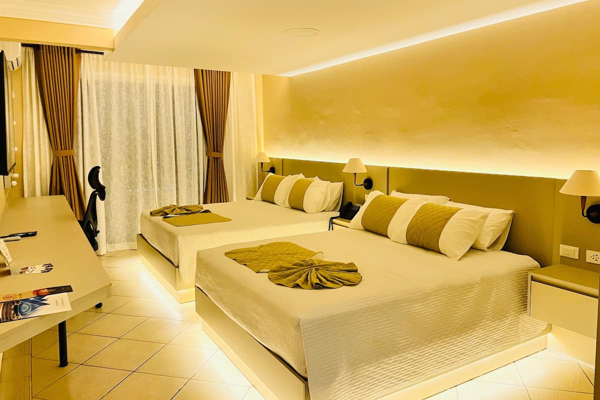 Deluxe Double Room | Down comforters, in-room safe, individually furnished, laptop workspace