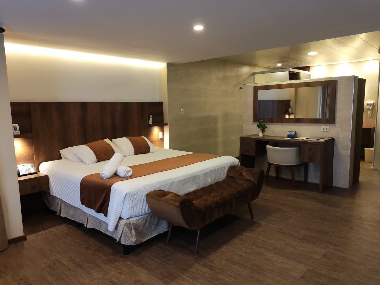 Deluxe Room, 1 King Bed, Pool View | Bathroom | Rainfall showerhead, hair dryer, soap, shampoo