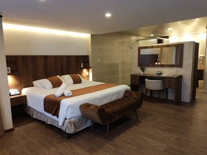 Deluxe Room, 1 King Bed, Pool View | Bathroom | Rainfall showerhead, hair dryer, soap, shampoo