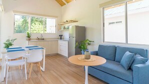 Design Villa, Beachside | Private kitchen | Full-size fridge, stovetop, dishwasher, electric kettle
