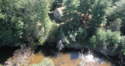 Cozy 3-bedroom cottage on the river in peaceful Free Soil!