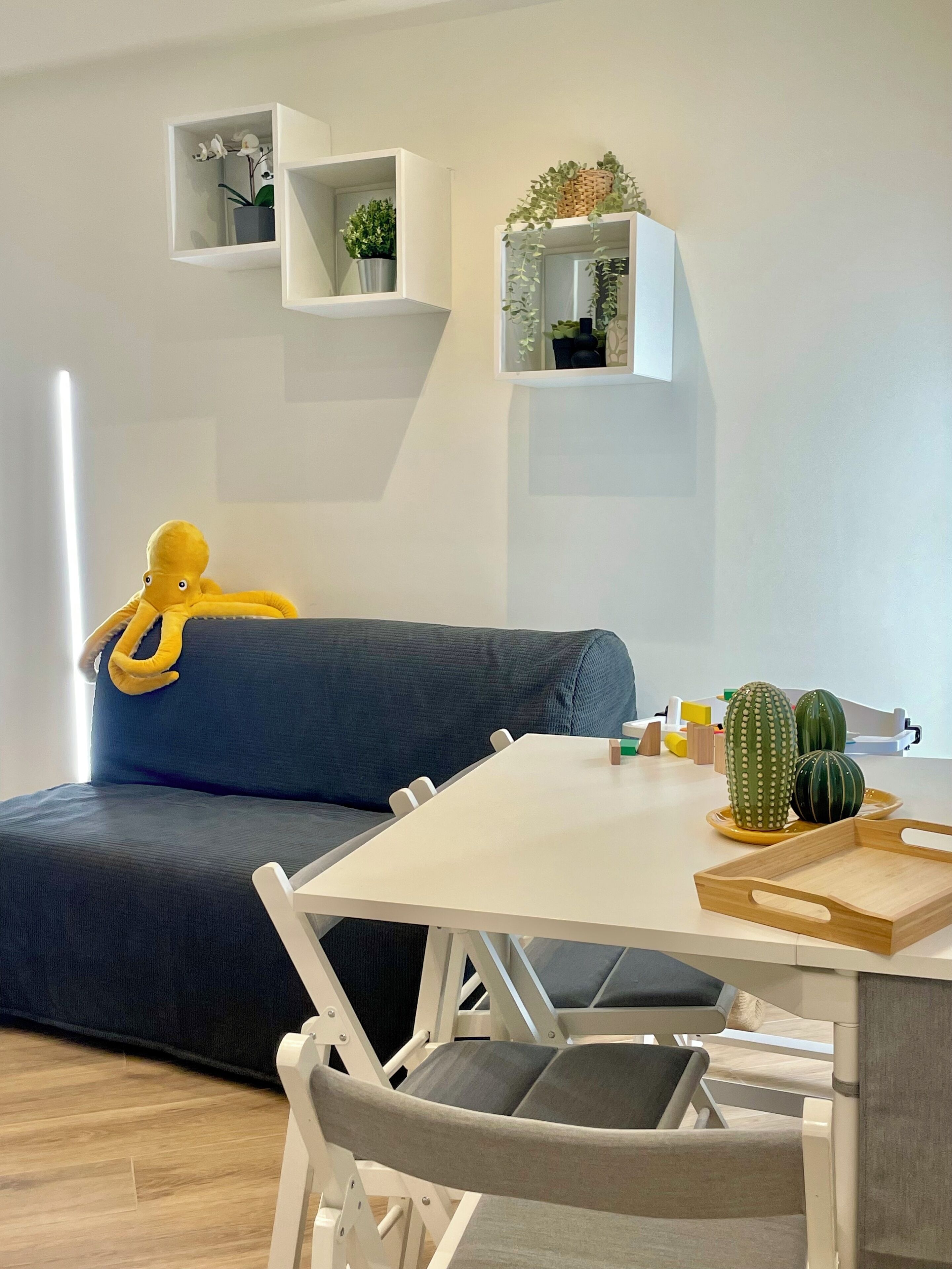 Family Apartment | Living area | Flat-screen TV, toys