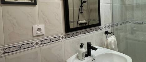 Hair dryer, bidet, towels, soap