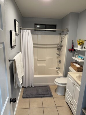 Hair dryer, towels, soap, shampoo