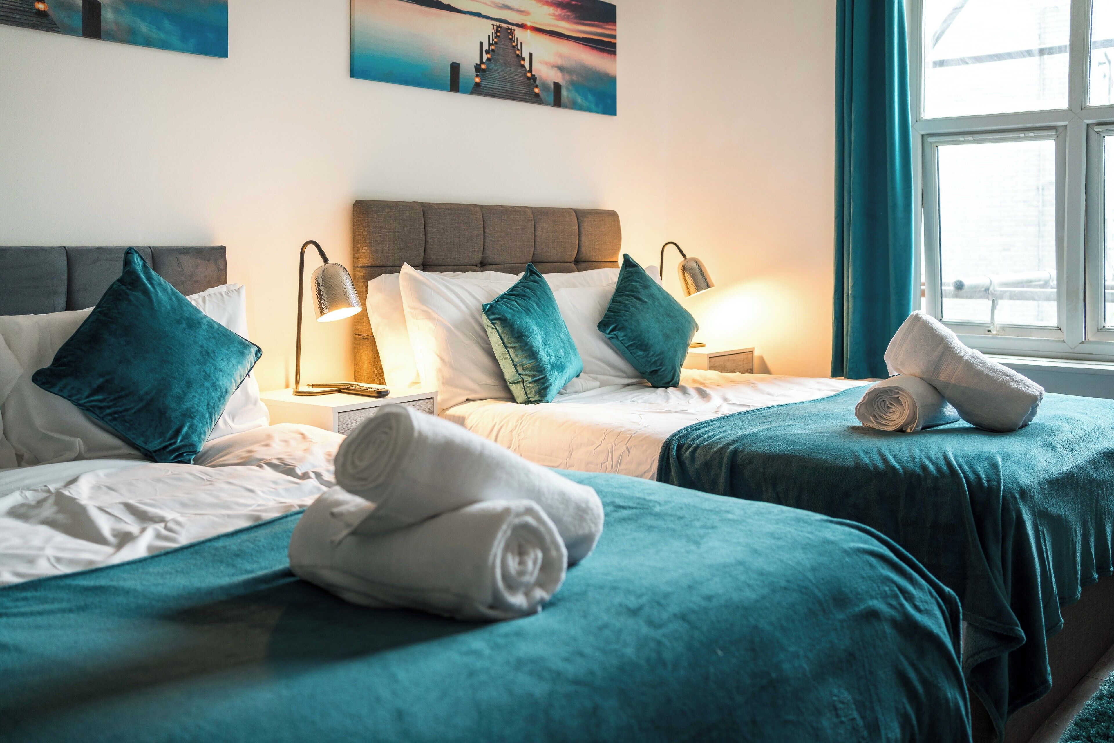 1 bedroom, desk, iron/ironing board, travel crib