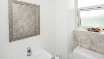 Hair dryer, towels, soap, shampoo