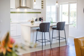Fridge, microwave, oven, stovetop - StayAU Magnificent Lakefront Villa  (Point Cook)