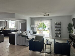 Living area - Backyard Paradise with Heated Pool, Putt Golf and Yard Games. (Mesa)